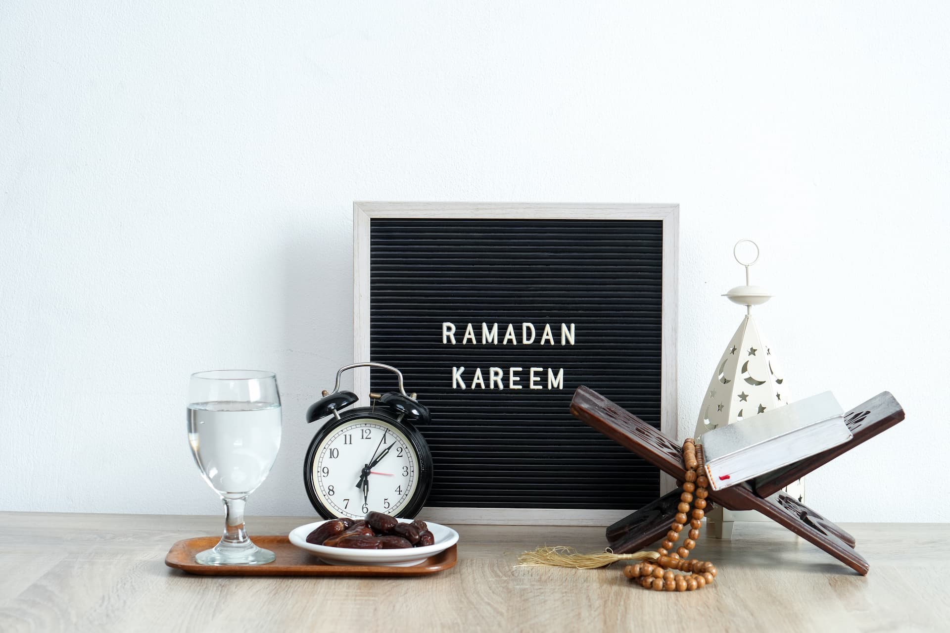 Ramadan kareem still life featuring dates and wate
